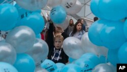 Des enfants lors d'une manifestation contre le trafic d'êtres humains à Madrid, en Espagne, le 22 octobre 2016. 