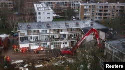 Emergency personnel work at the scene of an explosion in a residential area in The Hague, Netherlands, on Dec. 7, 2024.