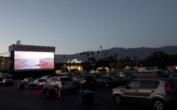 People watch the movie "Jaws" at The Tribeca Drive-In outside Rose Bowl stadium during the outbreak of the coronavirus disease (COVID-19), in Pasadena, California, July 2, 2020.