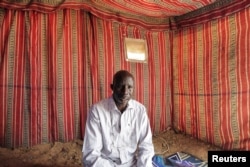 FILE - Hassan Zakariya, a medic who ran a field hospital in El Geneina, is pictured at a makeshift shelter in Adre, Chad July 27, 2023.