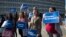 Activists with Planned Parenthood demonstrate in support of a pregnant 17-year-old being held in a Texas facility for unaccompanied immigrant children to obtain an abortion, outside of the Department of Health and Human Services in Washington, Oct. 20, 20