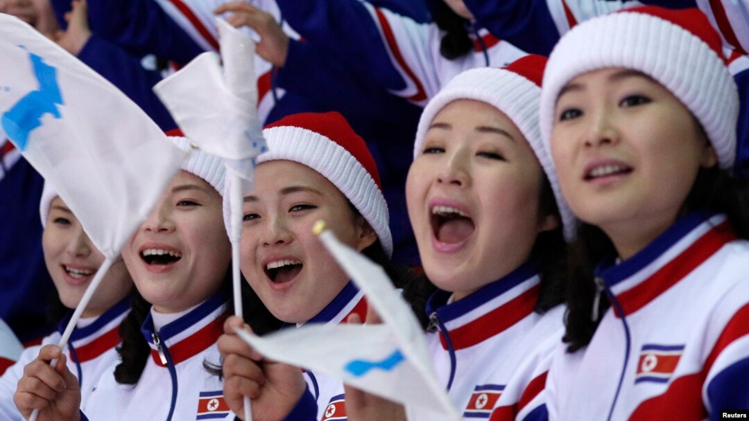 North Koreans attend the women's preliminary round ice hockey match between Sweden and the Unified Korean team druing the Pyeongchang 2018 Winter Olympics in Gangneung, South Korea, Feb. 12, 2018.