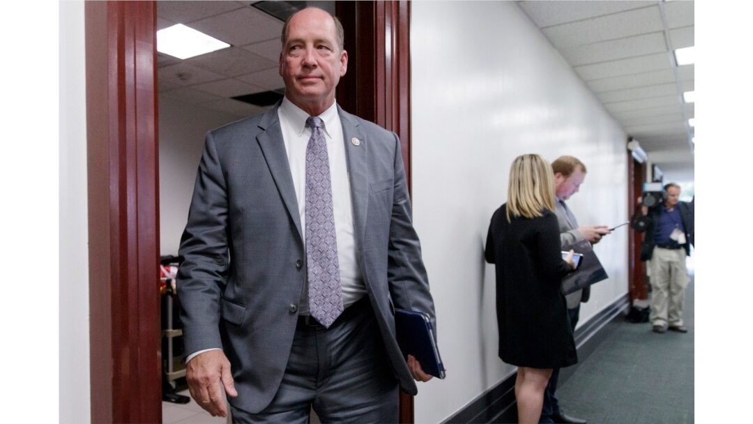 FILE - In this March 28, 2017, file photo, Rep. Ted Yoho, R-Fla., leaves a closed-door strategy session at the Capitol in Washington.