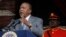 FILE - Kenyan President Uhuru Kenyatta delivers a speech at the Nyayo Nationa Stadium in Nairobi. 