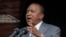 FILE - Kenyan President Uhuru Kenyatta delivers a speech at the Nyayo Nationa Stadium in Nairobi, Kenya. Kenyatta faces crimes against humanity in violence following 2007 election.