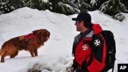 Eric Seelenfreund and his dog Murphy are part of the avalanche rescue team working for the 2010 Winter Olympics at Whistler Mountain