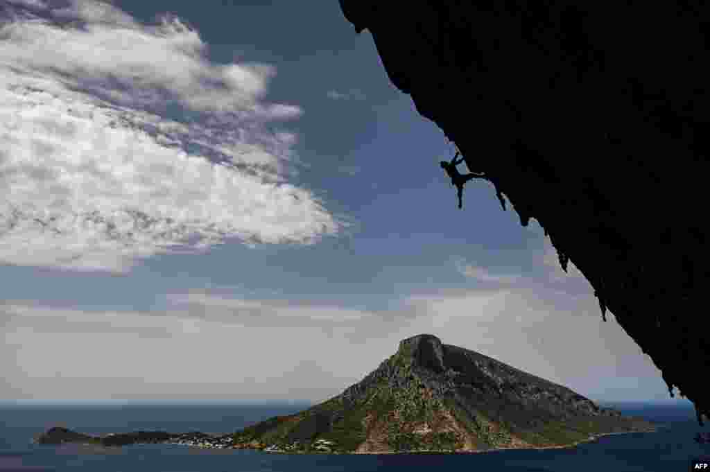 A climber participates in the 2019 annual Climbing Festival in the island of Kalymnos, Greece.