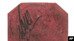 Perangko langka dari Guyana yang berbentuk segi delapan dicetak pada 1856 dengan tinta hitam pada kertas magenta.