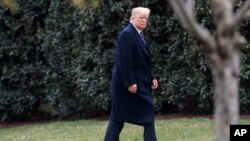 President Donald Trump walks to the Oval Office after speaking at the Latino Coalition Legislative Summit, Wednesday, March 7, 2018, in Washington.