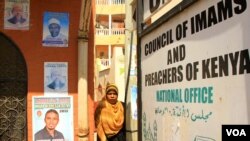 Campaign posters are seen on exterior walls of the office of the Council of Imams and Preachers of Kenya in Mombasa February 21, 2013 (J. Craig/VOA).