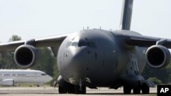 A Boeing C-17 transport aircraft, known as the Globemaster, shown here at the Papa Air Base in Papa, Hungary, July 27, 2009.