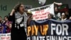 FILE - Activists participate in a demonstration for climate finance at the COP29 U.N. Climate Summit, Nov. 22, 2024, in Baku, Azerbaijan.