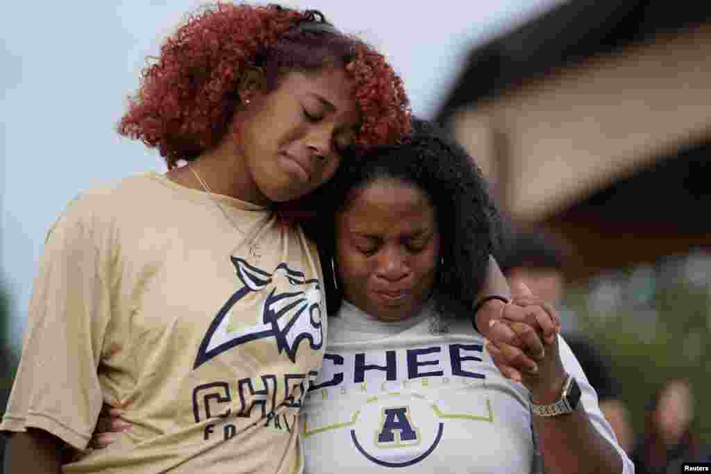 Women cry while attending a vigil at Jug Tavern Park following a shooting at Apalachee High School in Winder, Georgia, Sept. 4, 2024.&nbsp;The student, identified as Colt Gray, opened fire at the school, killing two students and two teachers and wounding nine, law enforcement officials said.