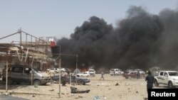 Serangan bom di kota Tuz Khormato, Irak hari Senin (9/6). 