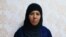 Rasmiya Awad, believed to be the sister of slain Islamic State leader Abu Bakr al-Baghdadi, who was captured on Monday in the northern Syrian town of Azaz by Turkish security officials, is seen in an unknown location in an undated picture provided by Turkish security officials. 