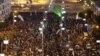 Egyptian army tanks secure the perimeter of the presidential palace while protesters gather chanting slogans against President Mohammed Morsi, in Cairo, Egypt, December 7, 2012.
