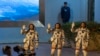 Astronaut China Wang Haoze (dari kiri ke kanan), Cai Xuzhe, dan Song Lingdong menyapa para hadirin saat menghadiri upacara pelepasan misi Shenzhou-19 di Pusat Peluncuran Satelit Jiuquan, China, pada 30 Oktober 2024. (Foto: AP/Ng Han Guan)