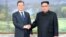 South Korean President Moon Jae-in shakes hands with North Korean leader Kim Jong Un during their summit at the truce village of Panmunjom, North Korea, May 26, 2018.