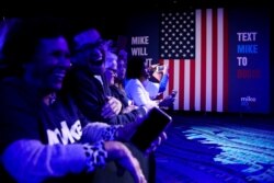 Supporters of Democratic presidential hopeful former New York mayor Mike Bloomberg attend a rally at Palm Beach County Convention Center in West Palm Beach, Florida, on Super Tuesday, March 3, 2020.