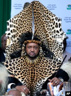 FILE - King Misuzulu ka Zwelithini looks on before receiving his certificate of recognition from South Africa's President Cyril Ramaphosa at the Moses Mabhida Stadium in Durban, South Africa, Saturday, Oct. 29, 2022.