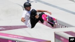 Tony Hawk, who is not a competitor, tries out the skate park at the 2020 Summer Olympics, July 23, 2021, in Tokyo, Japan.