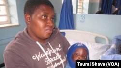 Silethubuhle Mkandla and her child Andiswa Nyoni, beneficiary of the Operation of Hope program.