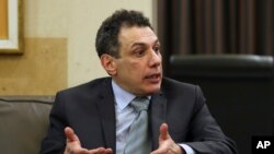 Nizar Zakka speaks during his meeting with Lebanese Prime Minister Saad Hariri, at the governmental palace in Beirut, Lebanon, June 11, 2019.