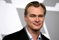 FILE - Director Christopher Nolan is seen at the 90th Academy Awards Nominees Luncheon in Beverly Hills, California, Feb. 5, 2018.