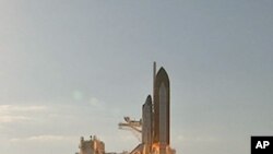 Space shuttle Discovery lifts off, February 24, 2011