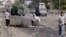 FILE- Protesters block a road during clashes with riot police in front of Al-Azhar University in Cairo, Egypt, Oct. 20, 2013. 
