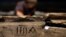 FILE - Roman numerals mark a timber from an old French frigate at the Bullock Texas State History Museum in Austin, Texas, Oct. 22, 2014. Similar carvings have been found on the wooden ribs of a section of an old sailing ship that has washed ashore on a Florida beach.