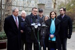 FILE — In this Dec. 11, 2018 photo, Attorney James Marsh, accompanied by sexual assault victims, and other attorneys, speaks during a news conference in front of Rockefeller University Hospital in New York.