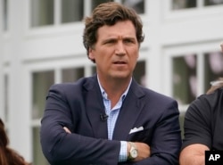 FILE - Tucker Carlson, shown here in Bedminster, N.J., on July 31, 2022, is one of the American commentators who figure prominently in Russian state-run media.