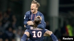 David Beckham mengumumkan pensiun dari sepakbola setelah membawa klub Paris Saint-Germain menjuarai liga Perancis (foto: dok). 