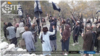 FILE - Fighters with IS-Khorasan vow allegiance to Islamic State leader Abu Ibrahim al-Hashimi al-Qurashi, in this photo issued Nov. 5, 2019, by SITE Intelligence Group. The U.S. is assigning responsibility for Friday's Moscow attack on the group.  