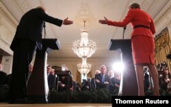 Britain's ambassador to U.S. Darroch listens during Trump-May joint news conference at the White House in Washington