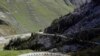 Cyclists climb Cormet de Roselend during the stage 18 of the Tour de France cycling race over 175 kilometers (108.7 miles) from Meribel to La Roche-sur-Foron, France.