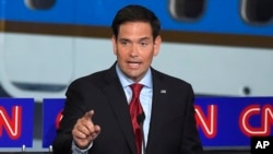 FILE - Republican presidential candidate Marco Rubio, shown during a debate Sept. 16, 2015, in Simi Valley, Calif., told ABC News that "I obviously don't come from a wealthy family."