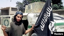 An undated photograph of a man described as Abdelhamid Abaaoud that was published in the Islamic State's online magazine Dabiq and posted on a social media website.