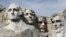 Барельеф, высеченный на горе Рашмор в честь четырех президентов США