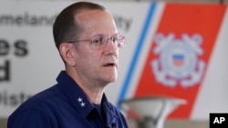 Coast Guard Rear Admiral John Mauger speaks to the media Monday June 19, 2023 in Boston.  (AP Photo/Steven Senne)