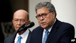 FILE - Attorney General William Barr speaks about the census as Commerce Secretary Wilbur Ross listens during an event with President Donald Trump in the Rose Garden at the White House, July 11, 2019, in Washington.