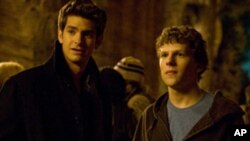 Andrew Garfield, left, and Jesse Eisenberg stars as 'Mark Zuckerberg' in Columbia Pictures' "The Social Network"