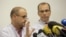 Professor Jean-Francois Payen, left, and Emmanuel Gay, right, answer questions from journalists during a press conference at the Grenoble hospital where Michael Schumacher is being treated after after sustaining a head injury during a ski accident in Meribel, France, Dec. 31, 2013. 