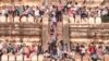 Crowds gather to watch the sunset on one of Bagan's temples. (Photo: John Owens for VOA)