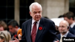 FILE - John McCallum, who at the time was Canada's immigration minister, speaks in the House of Commons on Parliament Hill in Ottawa, Ontario, Oct. 31, 2016. On Jan. 26, 2019, McCallum was fired as Canada's ambassador to China.