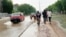 A main road in Chad's capital, Ndjamena, is flooded due to rainfall