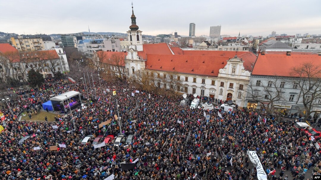 People gather at Slovak National Uprising (SNP) square during a rally under the slogan "For a Decent Slovakia," against corruption and to pay tribute to murdered Slovak journalist Jan Kuciak and his fiancee Martina Kusnirova on March 9, 2018 in Bratislava.