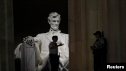 FILE - Security personnel are pictured at the Lincoln Memorial in Washington, Oct. 1, 2013. 