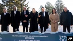 Ministers representing, from left, Japan, Britain, France, Canada, U.S. Germany and Italy post for a photo during the G7 foreign ministers meeting in Charlevoix, Quebec, March 13, 2025.